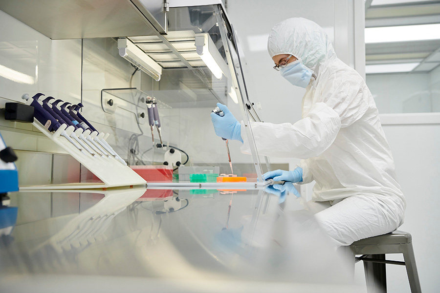 Deborah Bolnick conducts research in her clean lab at Beach Hall.